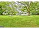 This beautiful, one-story home has lush landscaping and a well-manicured lawn at 306 Tyrone Rd, Fayetteville, GA 30214