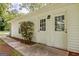 Exterior features of the garage include a double door, garden bed and a side entry at 306 Tyrone Rd, Fayetteville, GA 30214