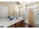Bathroom featuring a vanity with a sink, a mirror, and a bathtub, creating a functional space at 545 Grand Teton Cir, Fayetteville, GA 30215
