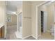 Bathroom with enclosed shower, tile floor, walk in closet, and neutral color scheme at 545 Grand Teton Cir, Fayetteville, GA 30215