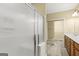 Bathroom featuring a glass shower and a vanity with double sinks, offering a luxurious experience at 545 Grand Teton Cir, Fayetteville, GA 30215
