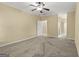 Neutral bedroom featuring a ceiling fan and light-colored walls, offering a serene and inviting space at 545 Grand Teton Cir, Fayetteville, GA 30215