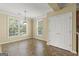 Bright dining area with large windows, tile floor, and closet for additional storage at 545 Grand Teton Cir, Fayetteville, GA 30215