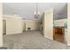 Spacious living area boasting neutral walls, plush carpeting, and an inviting fireplace for cozy gatherings and relaxation at 545 Grand Teton Cir, Fayetteville, GA 30215
