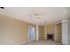 Finished basement with built-in bookshelves, fireplace, and a glass panel door at 235 Rustic Mill Ln, Fayetteville, GA 30214