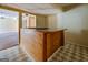 Basement bar area featuring countertop and tiled flooring at 235 Rustic Mill Ln, Fayetteville, GA 30214
