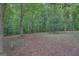 Beautiful wooded property provides privacy and natural beauty at 235 Rustic Mill Ln, Fayetteville, GA 30214