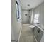 Bathroom featuring a glass enclosed shower, neutral walls, and a modern vanity at 295 Lamden Ct, Lawrenceville, GA 30046