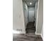 Well lit hallway with updated paint and flooring leads to other rooms at 295 Lamden Ct, Lawrenceville, GA 30046