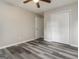 This bedroom features wood-look floors, closet, and fresh paint at 770 Four Winds Ln, Jonesboro, GA 30238