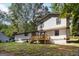Rear exterior showing the home's deck and large yard space at 770 Four Winds Ln, Jonesboro, GA 30238