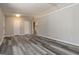 Living room featuring neutral walls, luxury vinyl flooring, and recessed lighting at 770 Four Winds Ln, Jonesboro, GA 30238