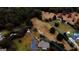 Aerial view showcases the property, nearby homes, and the surrounding landscape at 5300 Salem Rd, Covington, GA 30016