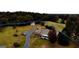 Aerial view of the property showing landscaping, driveway, and the surrounding area at 5300 Salem Rd, Covington, GA 30016