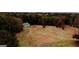Secluded metal barn in a rustic setting with open space, perfect for a workshop or storage at 5300 Salem Rd, Covington, GA 30016