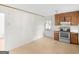 Kitchen with stainless steel appliances and plenty of room to move at 8310 Meridian Dr, Riverdale, GA 30274