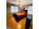 Comfortable bedroom with hardwood floors, natural light, and a decorative bedspread at 500 Circle Dr, Fayetteville, GA 30214