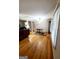 Spacious living room featuring wood floors, natural light, and classic charm at 500 Circle Dr, Fayetteville, GA 30214