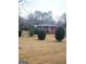 Backyard featuring a well-maintained lawn and manicured bushes at 500 Circle Dr, Fayetteville, GA 30214