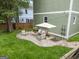 Backyard patio with outdoor furniture and green grass perfect for relaxing at 187 Vanira Se Ave, Atlanta, GA 30315
