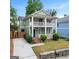 Inviting home with a spacious front yard and charming porch, perfect for enjoying the outdoors at 187 Vanira Se Ave, Atlanta, GA 30315