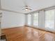 Sunlit living area with hardwood floors, offering a blank canvas for personalization and decor at 187 Vanira Se Ave, Atlanta, GA 30315