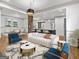 Open-concept living and dining area, showcasing modern design and ample space for comfortable living at 187 Vanira Se Ave, Atlanta, GA 30315
