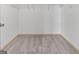Carpeted walk-in closet with shelving for storage at 187 Vanira Se Ave, Atlanta, GA 30315