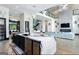 Spacious kitchen with a large marble island, stainless steel appliances, and open floor plan at 2401 Ne Greenglade Rd, Atlanta, GA 30345