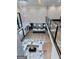 Open concept living area features two-story ceilings, modern design, and a large sectional at 2401 Ne Greenglade Rd, Atlanta, GA 30345