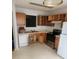 Kitchen featuring wooden cabinets, stainless steel appliances, and a double sink, ready for customization at 2756 Norfair Loop, Lithonia, GA 30038
