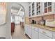 Kitchen with granite countertops, white cabinets, and stainless steel appliances at 5825 Trailwood Ct, Suwanee, GA 30024