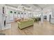 Open-concept living room with hardwood floors, coffered ceilings, and fireplace at 5825 Trailwood Ct, Suwanee, GA 30024