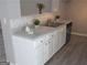 Kitchen sink and counter with backsplash, complemented by updated fixtures at 5400 Twin Lakes Dr, South Fulton, GA 30349