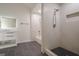 Stylish bathroom showcasing a sleek vanity, tiled shower with bench, and modern fixtures at 4959 Abbotts Glen Nw Trl, Acworth, GA 30101