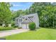 Charming two-story home with a well-manicured lawn and attached two-car garage at 4959 Abbotts Glen Nw Trl, Acworth, GA 30101