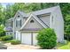 Charming two-story home with a well-manicured lawn and attached two-car garage at 4959 Abbotts Glen Nw Trl, Acworth, GA 30101