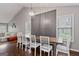 Dining room with wainscotting and a vaulted ceiling, complete with plenty of natural light at 192 Sandhurst Ct, Suwanee, GA 30024