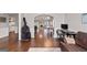 Open-concept living area featuring wood floors and an abundance of natural light at 192 Sandhurst Ct, Suwanee, GA 30024