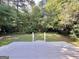 Enjoy this home's serene backyard with deck and fire pit at 10173 Brass Ring Rd, Jonesboro, GA 30238