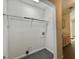 Small laundry room featuring washer hookups at 10173 Brass Ring Rd, Jonesboro, GA 30238