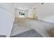 Spacious living room with neutral carpeting, vaulted ceiling and natural light at 10173 Brass Ring Rd, Jonesboro, GA 30238