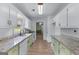 Bright kitchen with granite countertops, modern appliances, and updated cabinets at 2000 Stacia Dr, Covington, GA 30016