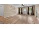 Spacious living room featuring modern flooring, fresh paint, and multiple ceiling fans at 2000 Stacia Dr, Covington, GA 30016
