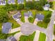 Aerial view of homes in a cul-de-sac surrounded by lush greenery and trees at 102 Natalie Ct, Dallas, GA 30157