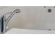 Close-up of a bathtub with a chrome faucet and clean, white interior at 102 Natalie Ct, Dallas, GA 30157