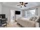 Spacious bedroom with vaulted ceiling, ceiling fan, and view of the bathroom at 102 Natalie Ct, Dallas, GA 30157