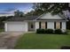 Charming single-story home with a manicured lawn, attached garage and welcoming front door at 102 Natalie Ct, Dallas, GA 30157
