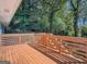 Spacious wooden deck overlooking lush greenery, perfect for outdoor relaxation and entertainment at 2739 Flagstone Se Dr, Atlanta, GA 30316