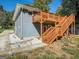 Charming home featuring a multi-level wooden deck with stairs, offering a unique outdoor living space at 2739 Flagstone Se Dr, Atlanta, GA 30316
